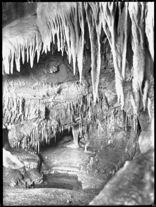 The Bath of Venus in Skeleton Cave [picture] : [Jenolan Caves, New South Wales] / [Frank Hurley]