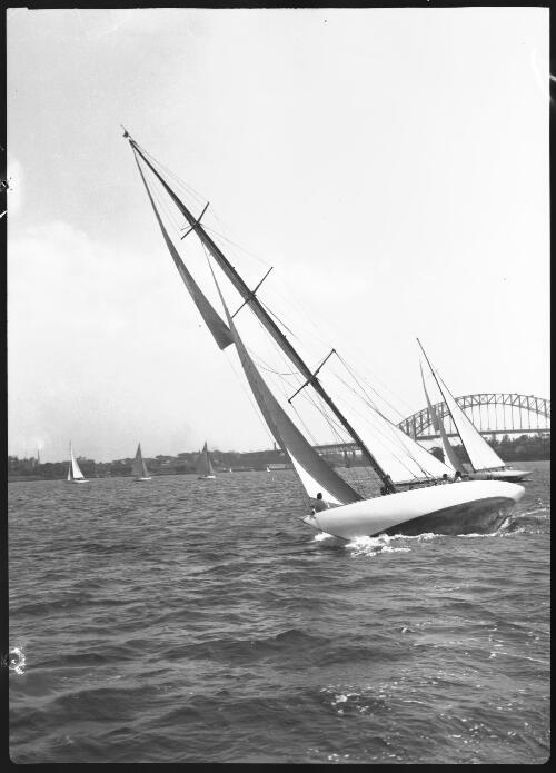 [Sailing yachts on Sydney Harbour with the Harbour Bridge in background, 2] [picture] / [Frank Hurley]