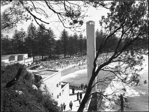 Manly through trees showing Shark Tower [picture] : [Beaches, Sydney, New South Wales] / [Frank Hurley]