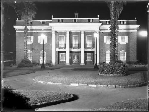 Council Chambers by night, front elevation [Manly Municipal Council Chambers] [picture] : [Beaches, Sydney, New South Wales] / [Frank Hurley]