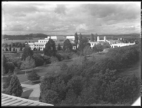 Parliament House (from Secretariat), general view [ca. 1938] [picture] : [Canberra, Australian Capital Territory] / [Frank Hurley]