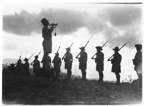 Bugler and line of soldiers, ca. 1940, 1 [picture] / [Frank Hurley]