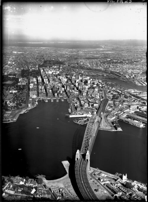[Sydney Harbour Bridge to Botany Bay, 1950s] [picture] : [Sydney, New South Wales, Aerial] / [Frank Hurley]