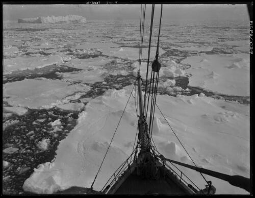 The Aurora in heavy pack ice north of termination ice tongue, off Queen Mary Land [Australasian Antarctic Expedition, 1911-1914] [picture] : [Antarctica] / [Frank Hurley]