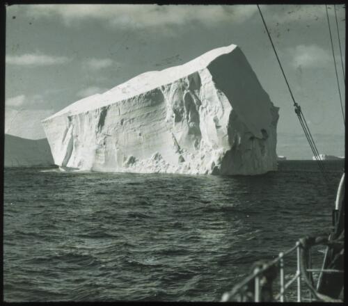 [Iceberg and ship's rail, Banzare, 1929-1931] [picture] : [Antarctica] / [Frank Hurley]