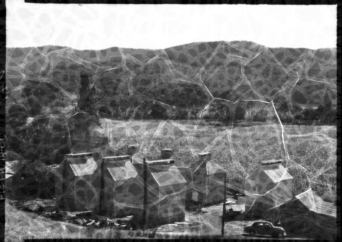 Drying kilns tobacco plantation Ovens valley Vic. [picture] : [Victoria] / [Frank Hurley]