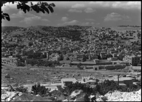Town of Hebron [cemetery in foreground] [picture] / [Frank Hurley]