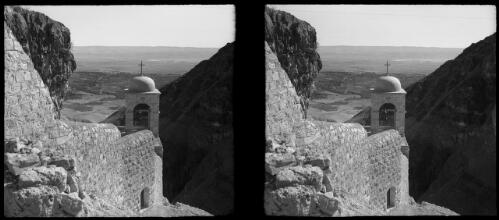 View across the Jordan valley to the hills of Moab from the monastry on Mt Quarantine [picture] / [Frank Hurley]