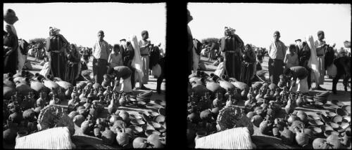 Village fair Esdud Palestine [showing clay vessels, urns and pots] [picture] / [Frank Hurley]