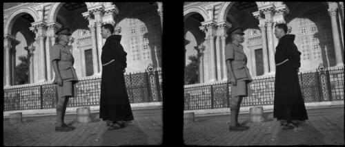 Jerusalem [Frank Hurley wearing military uniform and a man in a monk's habit outside an ornate building with archways] [picture] / [Frank Hurley]