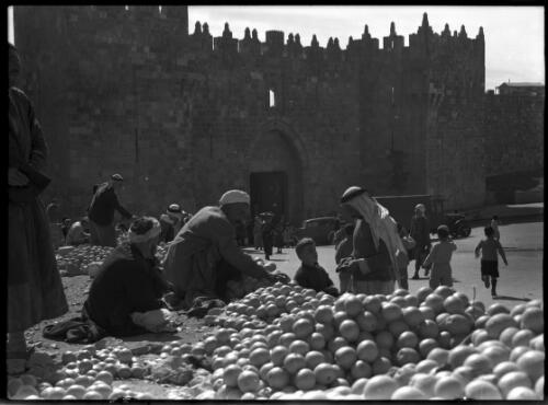 Orange seller, Damascus Gate Jerusalem [picture] / [Frank Hurley]