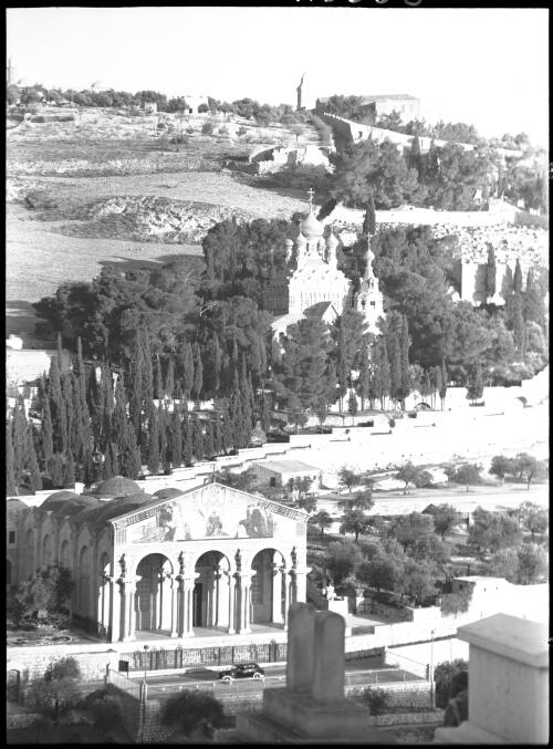 Mt of Olives [with the Basilica of the Agony in front and the Russian Church of Saint Mary Magdalene in the centre, Jerusalem] [picture] / [Frank Hurley]