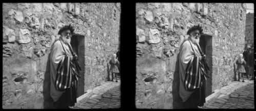 Orthodox Jew, Jerusalem [wearing striped robe] [picture] / [Frank Hurley]