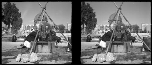Jerusalem [figures at a well in the Haram esh Sharif, ca. 1940-1945] [picture] / [Frank Hurley]