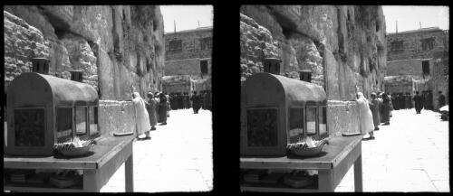 Wailing Wall [Jerusalem, figures, books, incense, ca. 1940-1945] [picture] / [Frank Hurley]