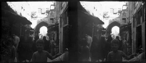 Jerusalem [street scene with a stone arch, ca. 1940-1945] [picture] / [Frank Hurley]