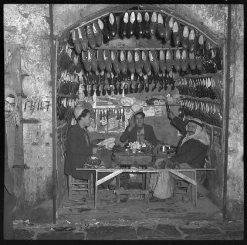 Street scenes in Jerusalem [cobblers and a shoe shop] [picture] / [Frank Hurley]