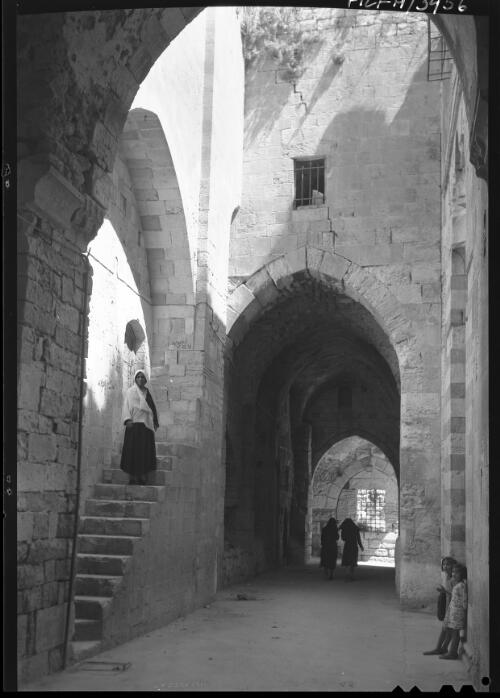 [The narrow, noisy thoroughfares and bazaars, and vaulted tunnels of Jerusalem] [picture] / [Frank Hurley]