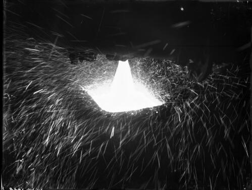 [Pouring molten ore?] [picture] : [Newcastle, New South Wales] / [Frank Hurley]