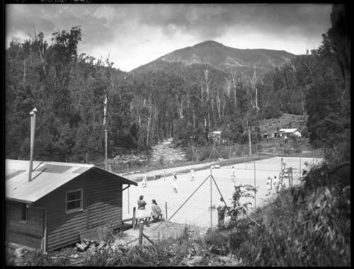 Tennis courts [Kiewa, December 1947] [picture] : [State Electricity Commission of Victoria] / [Frank Hurley]