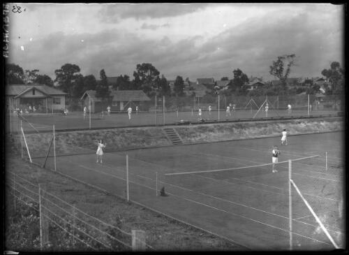 Tennis court panorama, 1 [Yallourn, Victoria, December 1947] [picture] : [State Electricity Commission of Victoria] / [Frank Hurley]