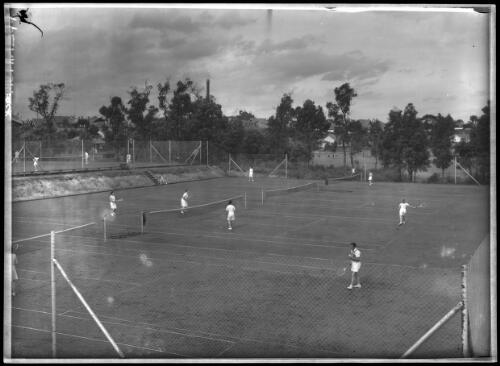 Tennis court panorama, 2 [Yallourn, Victoria, December 1947] [picture] : [State Electricity Commission of Victoria] / [Frank Hurley]