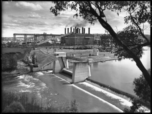 Power House across the Latrobe R. [Latrobe River, power station, Yallourn, Victoria, December 1947] [picture] : [State Electricity Commission of Victoria] / [Frank Hurley]