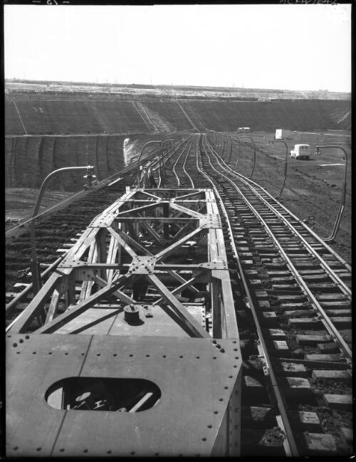 Track shifters[?] from Boom [open cut coal mine, Yallourn, Victoria, December 1947] [picture] : [State Electricity Commission of Victoria] / [Frank Hurley]