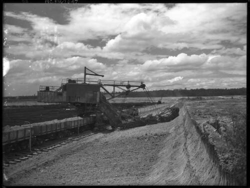 Overburden dredge [open cut coal mine, Yallourn, Victoria, December 1947] [picture] : [State Electricity Commission of Victoria] / [Frank Hurley]
