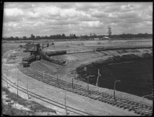 Overburden dredge [open cut coal mine, Yallourn, Victoria, December 1947] [picture] : [State Electricity Commission of Victoria] / [Frank Hurley]