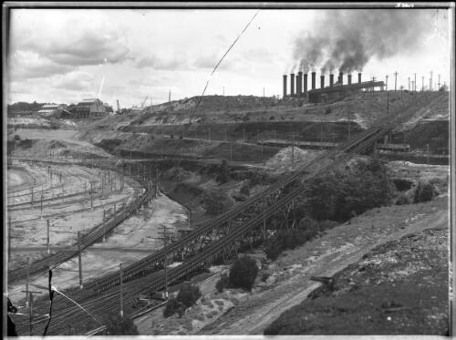 Steep haulage [open cut coal mine, Yallourn, Victoria, December 1947] [picture] : [State Electricity Commission of Victoria] / [Frank Hurley]