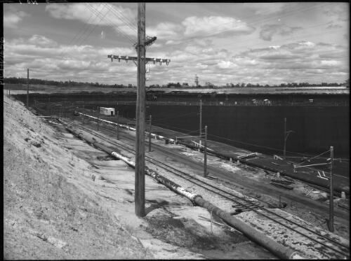 Panorama of open cut Yallourn photographed from S. corner [coal mine, December 1947] [picture] : [State Electricity Commission of Victoria] / [Frank Hurley]
