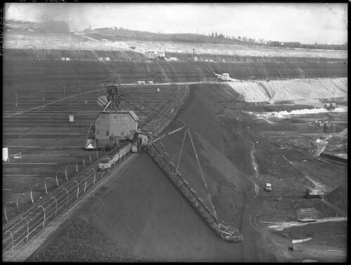 Coal dredgers No. 2 level SE corner [open cut coal mine, Yallourn, Victoria, December 1947] [picture] : [State Electricity Commission of Victoria] / [Frank Hurley]
