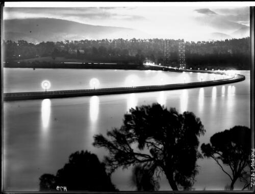 Bridge by night [picture] : [Hobart, Tasmania] / [Frank Hurley]