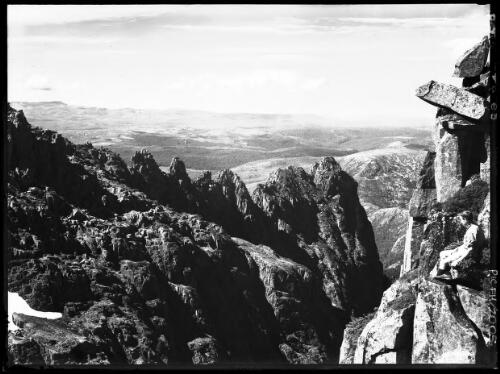 Two views of Cradle Mountain contour [with figure] [picture] : [Cradle Mountain, Tasmania] / [Frank Hurley]