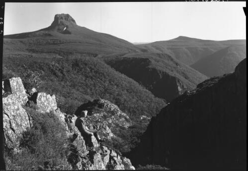 Barn Bluff [with figure] [picture] : [Cradle Mountain, Tasmania] / [Frank Hurley]