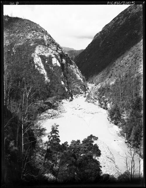 King R [King River] Gorge, vertical with shadow on one cliff face [picture] : [Queenstown, Tasmania] / [Frank Hurley]