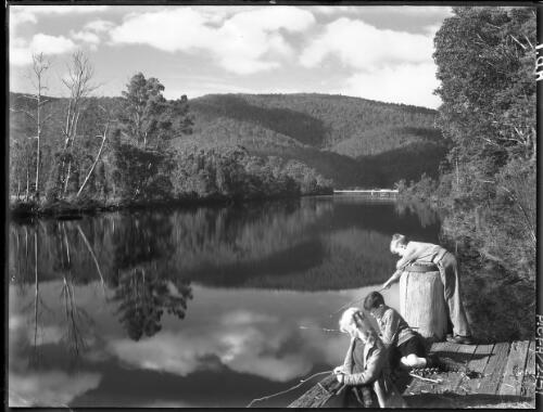 Huon R with reflections [river and three children] [picture] : [Huon District, Tasmania] / [Frank Hurley]