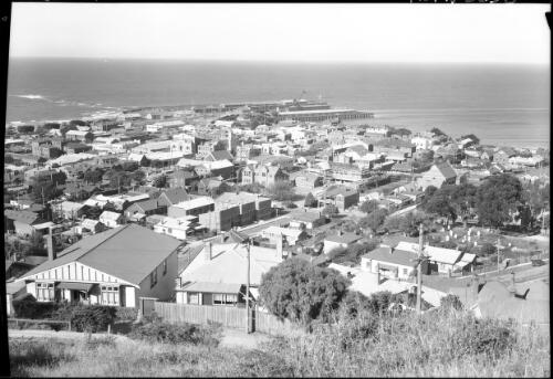 Burnie [houses and sea] [picture] : [North West Coast, Tasmania] / [Frank Hurley]