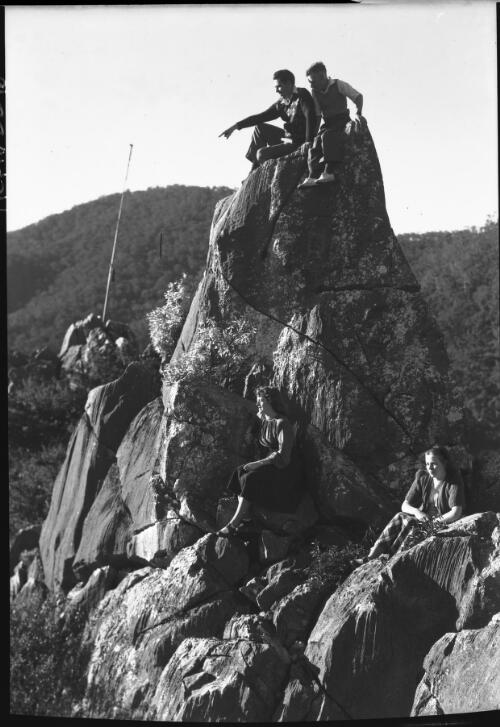 [A rocky crag with four figures] [picture] : [Tasmania] / [Frank Hurley]