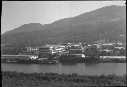 Paper mills near New Norfolk [Australian Newsprint Mills Limited at Boyer and the Derwent River] [picture] : [Tasmania] / [Frank Hurley]