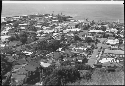 Burnie [houses and sea, viewed from above] [picture] : [Burnie, Tasmania] / [Frank Hurley]
