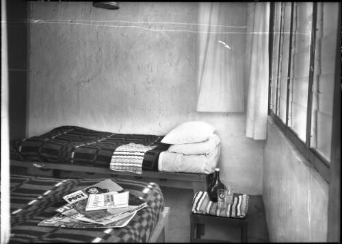 Accommodation Glen Helen [interior shot showing a bedroom with louvred windows, Life, Pix, Australasian Post and Argosy magazines] [picture] : [Central Australia] / [Frank Hurley]