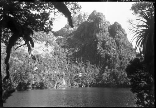 Tahune, horizontal [Lake Tahune and Lions Head? beyond, near Frenchman's Cap] [picture] : [Frenchman Range, Tasmania] / [Frank Hurley]