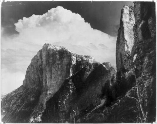 [Frenchman's Cap on the left, Nicoles Needle on the right, from near Barron Pass] [picture] : [Queenstown, Tasmania] / [Frank Hurley]