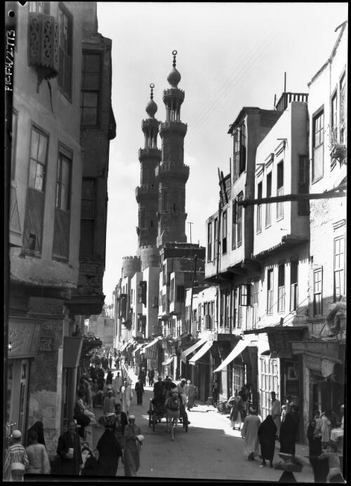 Street in old Cairo near the Bab Mitwelly [Bab El Mitwelly, horse and cart, figures] [picture] : [Cairo, Egypt, World War II] / [Frank Hurley]