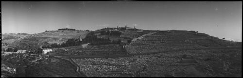 [Cemetery, Garden of Gethsemane and the Basilica of the Agony,  higher up the Russian Church of Saint Mary Magdalene, on the summit of the Mount is a Moslem minaret and alongside the Church of the Ascension, Jewish cemetery on the right, ca. 1940-1945] [picture] / [Frank Hurley]