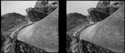 [Close-up of gutter and drainage of the central section of the temple of El Dier or Ad-Dayr, Petra] [picture] : [Jordan, World War II] / [Frank Hurley]