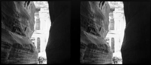 El Khazna (or Khasneh) [Petra Gorge on either side and horse] [picture] : [Jordan, World War II] / [Frank Hurley]