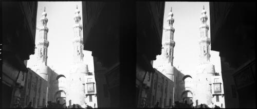 The twin minarets of El Muyyad [Muayyad] which surmount the Bab Zuweila [Zuwayla] grotto Cairo [picture] : [Egypt, World War II] / [Frank Hurley]